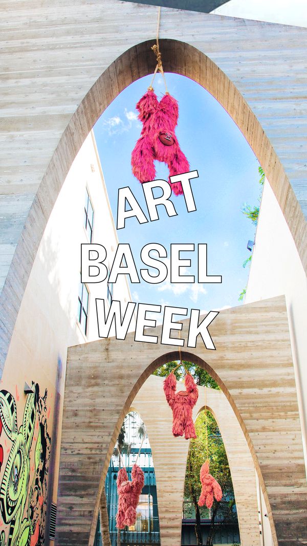 Art Basel Week text layered on an image of wooden archways with pink sloths stuffed animals hanging 