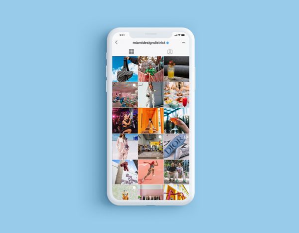 iPhone showing Miami Design District instagram feed on a blue background 