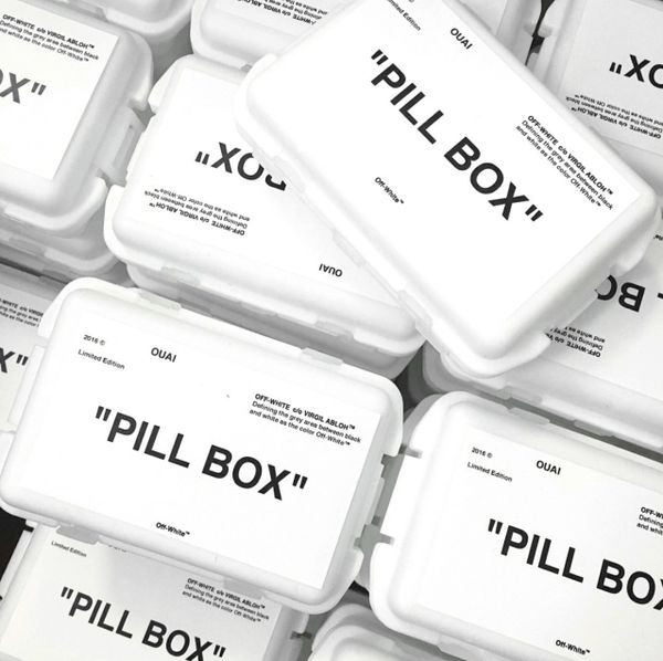 A pile of OUAI OffWhite pill boxes